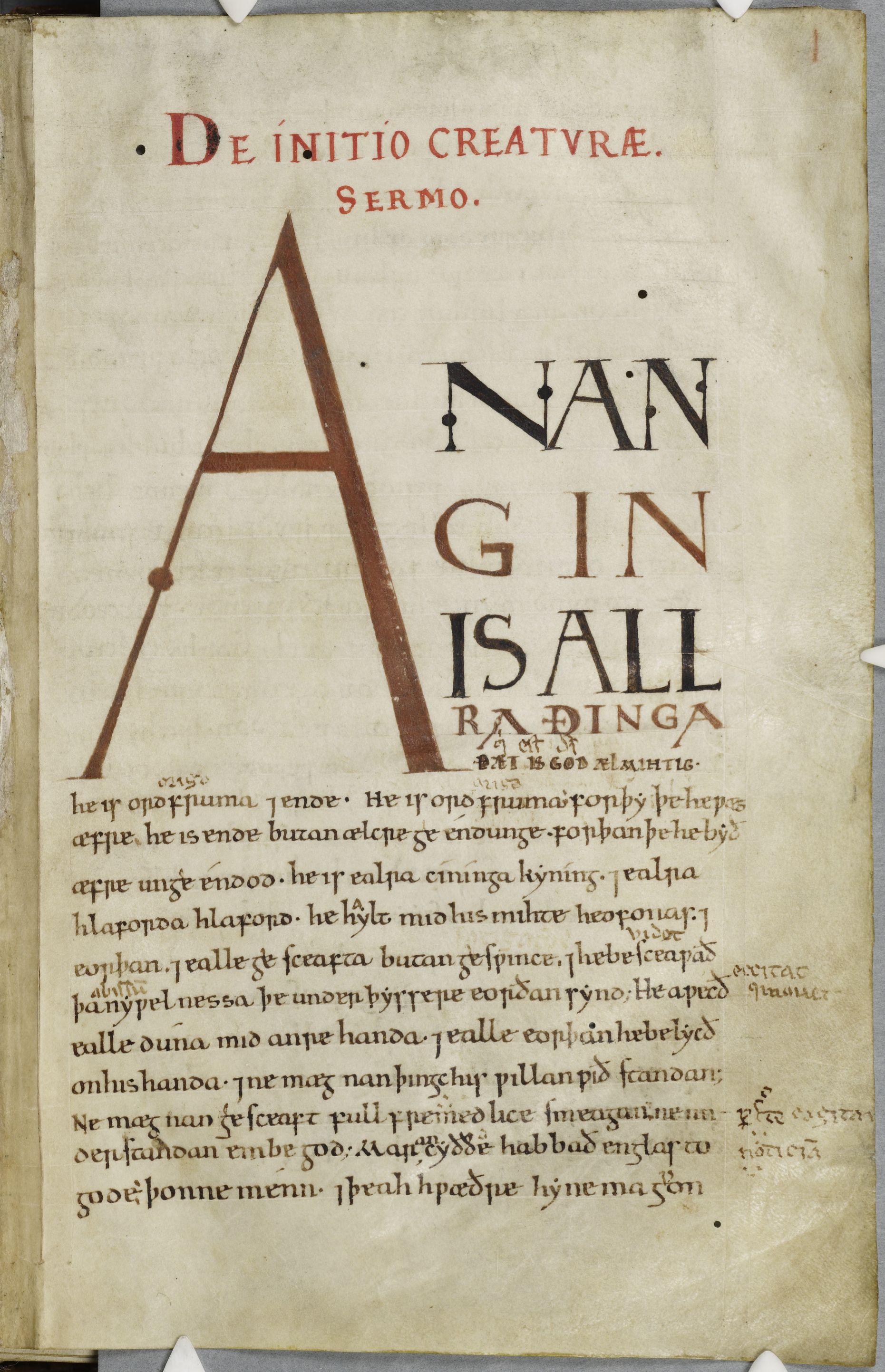 This yellowed manuscript folio contains the Old English text of Ælfric's homily "De Initio Creaturae" ("On the Begining of Creation"). The top half of the folio is dominated by the opening words of the poem: "An angin is allra ðinga..." The first "A" covers nearly a third of the folio by itself, with the text getting smaller and smaller to the side.