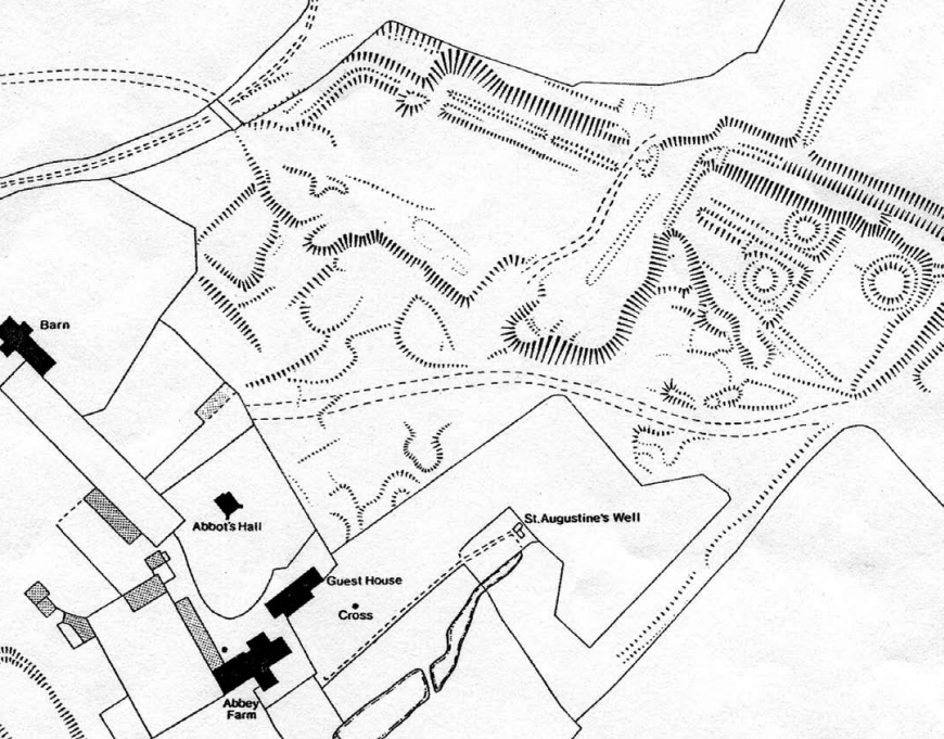 Black-and-white map of extant structures at Cerne Abbey. Standing buildings from later centuries are marked in black on the left-hand side, while dotted lines indicate unexcavated earthworks from earlier centuries on the right.
